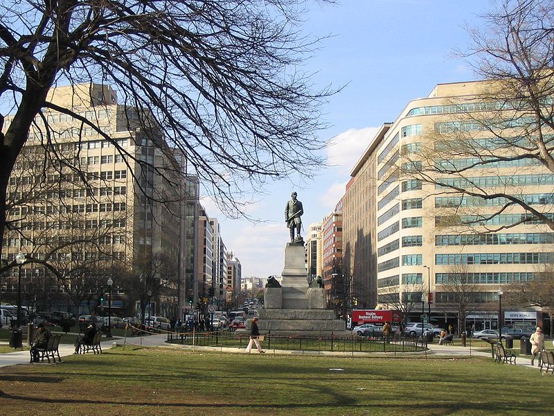 The planned transfer station at Farragut Square had to be replaced with two separate stations with no connection on opposite sides of the square because the National Park Service was unwilling to allow excavation on the site or the temporary removal of the statue of Admiral Farragut. Photo from Wikipedia.